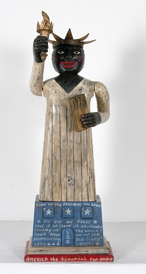Shane Campbell. Black Statue of Liberty.: Shane Campbell. Black Statue of Liberty. Signed. Not dated. Painted wood with mixed media. Excellent condition. 6” x 10” x 27”h. Est. $500-800. Ship: $65