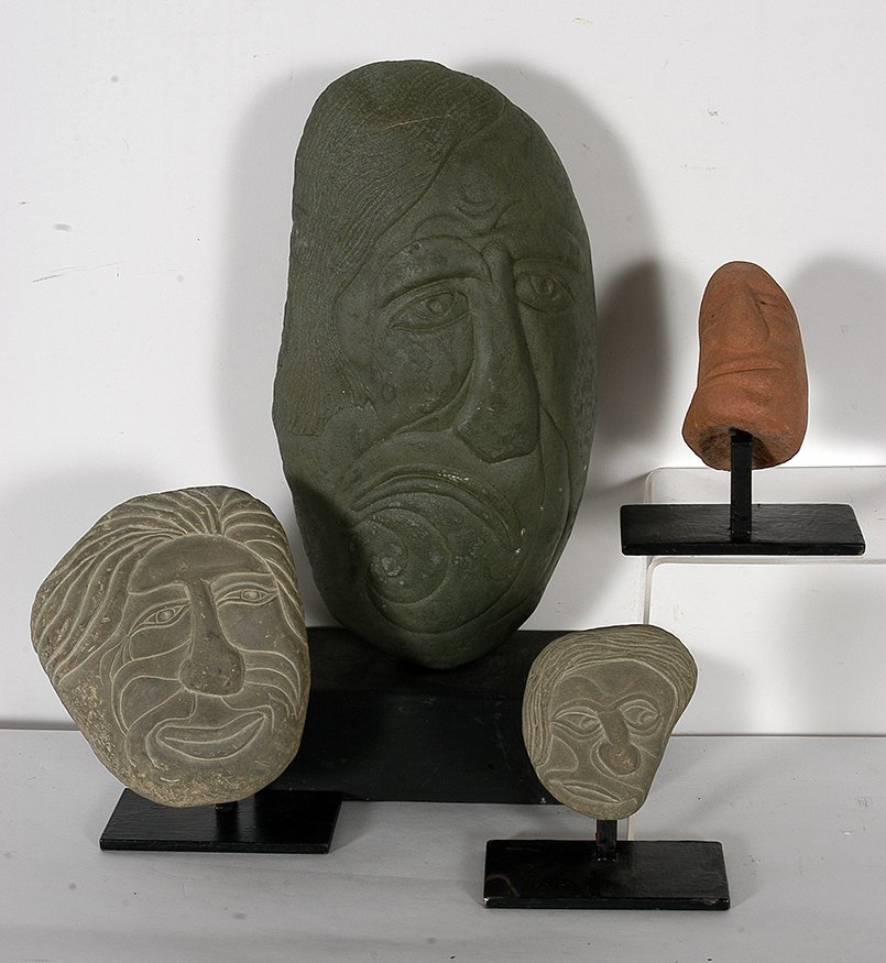 David Marshall. Group Of Four Heads.: David Marshall. Group Of Four Heads. Carved Stone on display stands. Excellent condition. Tallest with stand is 15”h. Est. $600-900. Ship: $65
