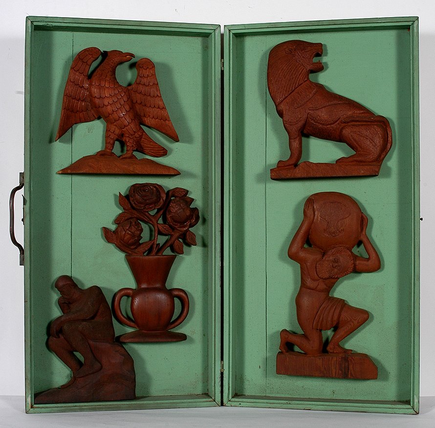 Philip Chabot. Charles Atlas, The Thinker, Eagle &: Philip Chabot. Charles Atlas, The Thinker, Eagle and Lion. c. 1940’s. Carved natural wood attached to homemade box. Excellent condition. 18” x 36”. Est. $800-1,200. Ship: $150