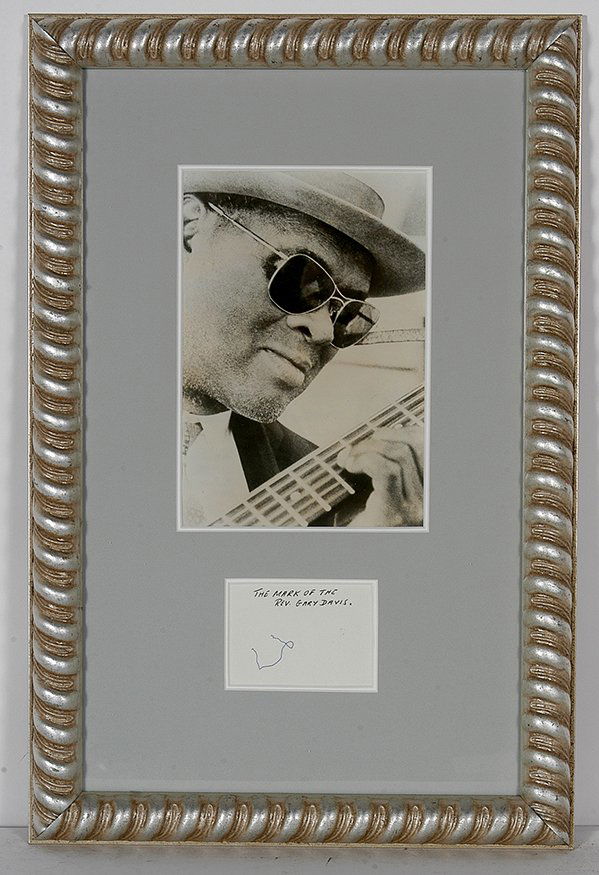 Rev. Gary Davis. Photo With Signature Card.: Rev. Gary Davis (1896-1972). Photo With Signature Card. Also known as Blind Gary Davis. Blues and Gospel Singer, his finger picking style influenced Bob Dylan and The Grateful Dead. Gary Davis, blind