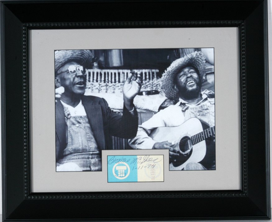 Sonny Terry & Brownie McGhee. Phot o& Signature, 1974.: Sonny Terry & Brownie McGhee. Photograph and Signature Card. 1/11/74. Signed and dated by both artists. Photo is 10” x 8”. Signature card is 3.5” x 1.5”. Frame is 17.5” x 15”. Excellent co