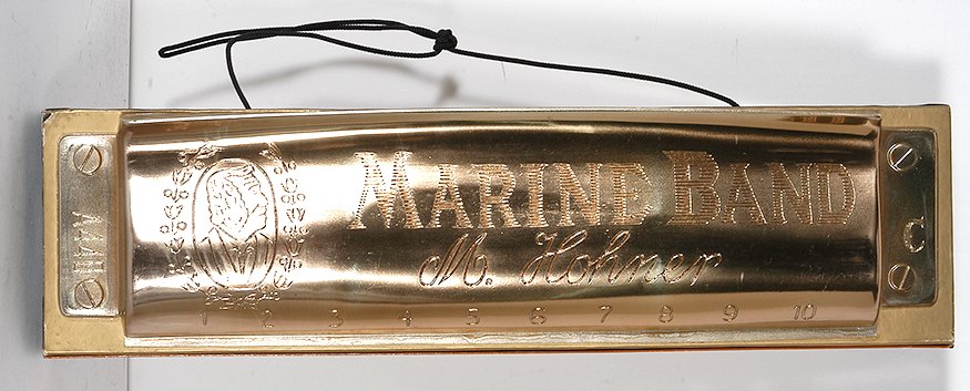 Autographed Marine Band Store Display Harmonica. c.: Marine Band Store Display. Autographed Trade Store Harmonica. c. 1970. Signed by Jerry Boogie McCain, Neal Pattman, Carey Bell, Sam Meyers mark, Snooky Pryors and more. 24” x 6.5” x 5”. Excellen