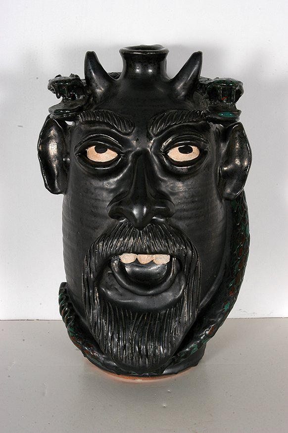 Kim Black. Devil Face Jug w Two-Headed Snake.: Kim Black. Large Devil Face Jug With Two-Headed Snake. 2000. Signed and dated. Mixed glaze. Mint condition. 15”h. Est. $200-400. Ship: $65