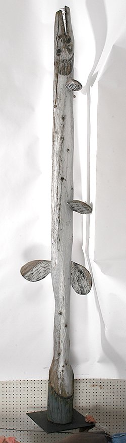 Ed Kay. Sturgeon Totem.: Ed Kay (Mt. Clemons, MI). Sturgeon Totem.c. 1940’s-50’s. This was the first totem made by Ed. 9 feet tall. Wood painted silver, applied fins with nails for teeth. Great condition with some environ