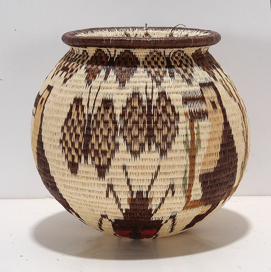 Darrien Rain Forest. Parrot, Birds & Butterflies: Darrien Rain Forest. Parrot, Beetle, Birds and Butterflies Basket. Not signed. Natural fiber and dye. Hand woven. Excellent condition. 5.5”h. Est. $600-900. Ship: $35