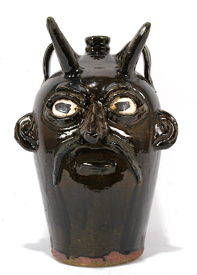Chester Hewell. Large Devil Face Jug.: Chester Hewell. Large Devil Face Jug. Signed. Traditional glaze. Mint condition. 16". Est. $600-900. Ship: $85
