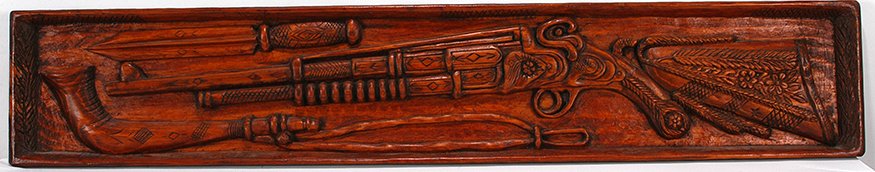 Daniel Pressley. Gun.: Daniel Pressley. Gun. Not dated. Carved wood relief plaque with varnish. Excellent condition. 54w x 10". Provenance: ex. Jonathan Demme Collection, purchased from Cavin Morris Gallery, NY. Est. $1,000