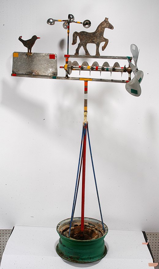 Vollis Simpson. Cork Screw Trotting Horse Whirligig.: Vollis Simpson. Cork Screw Trotting Horse Whirligig. Not signed. Welded metal and mixed media. Excellent condition. 68" x 37" x 13" including stand. Est. $800-1,200. Ship: $200