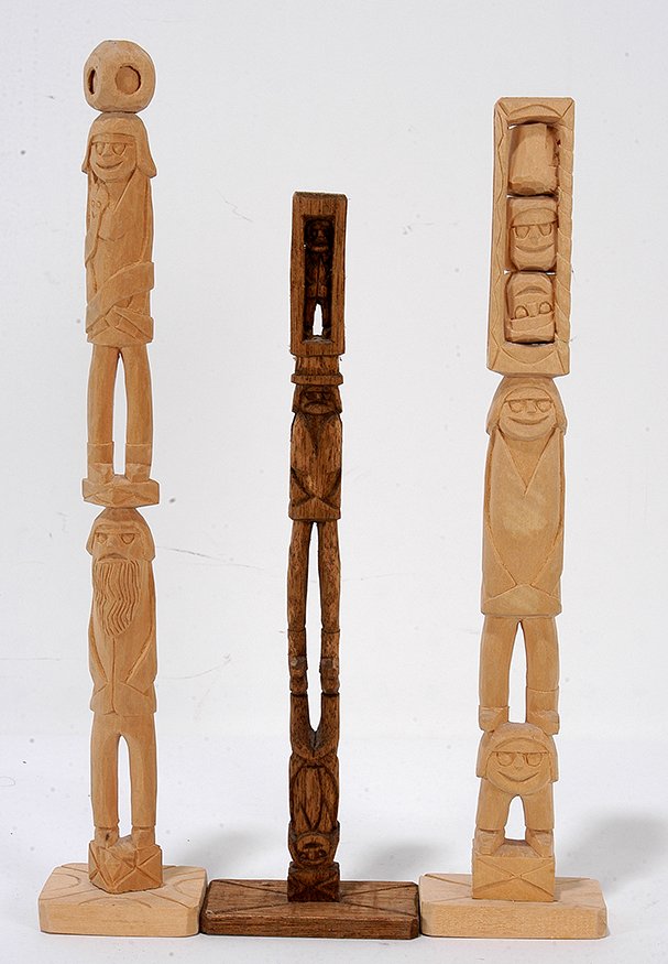 Rev. Herman Hayes. Three Totems: Rev. Herman Hayes. Three Totems. 1988-93. Signed and dated. Carved wood. One is stained. Excellent condition. Average size is 17". Est. $300-500. Ship: $45