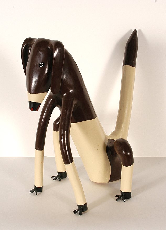 Calvin Cooper. Brown & Tan Coon Hound.: Calvin Cooper. Brown and Tan Coon Hound. 1994. Signed and dated. Carved and painted wood. Excellent condition. 14” x 14” x 9”. Est. $100-200. Ship: $55