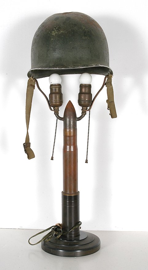 Trench Art. Lamp.: Trench Art. Lamp. Helmet, mortar and mixed media. Good condition. 25”h x 9”w. Est. $200-300. Ship: $55