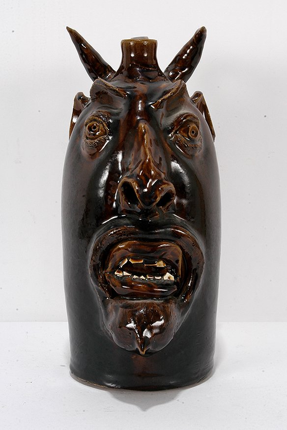 Robert Brown. Traditional Glaze Devil Face Jug.: Robert Brown. Traditional Glaze Devil Face Jug.1990. Signed and dated. Mint condition. 14”h. Est. $300-400. Ship: $85