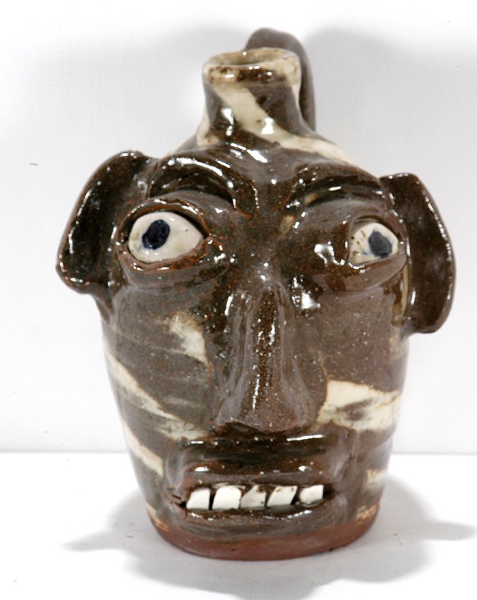 B.B. Craig. Two Color Swirl Face Jug.: B.B. Craig. Two Color Swirl Face Jug.Stamped. Mint condition. 8”h. Est. $200-300. Ship: $45