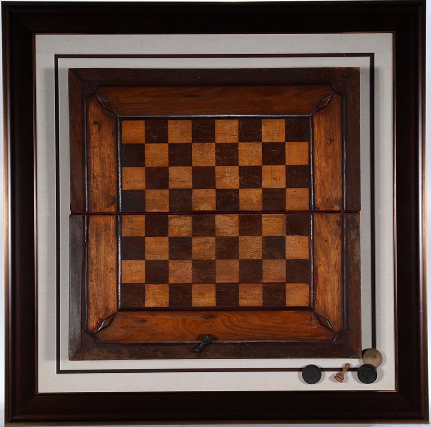 Gameboard Inlaid Marquetry.: Gameboard Inlaid Marquetry.c. 1880’s. Inlaid mahogany, black walnut, oak and yellow pine. Nice patina. Normal wear. Great condition. Board is 19” x 19”. Frame is 28” x 28”h. Est. $300-500. S