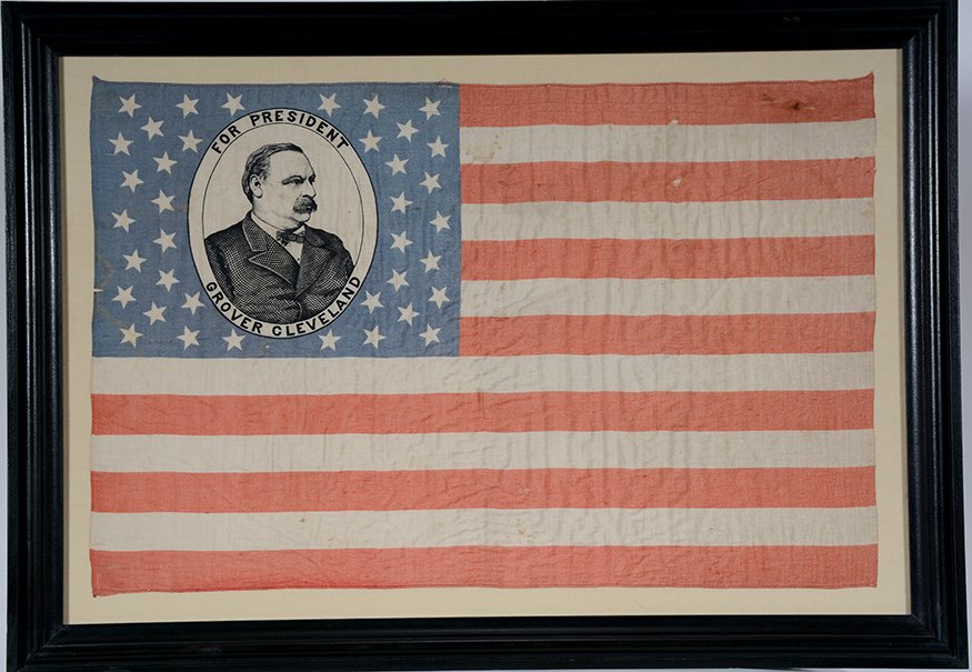 Grover Cleveland For President Campaign Flag.: Grover Cleveland For President Campaign Flag.1884 Democratic candidate. Printed on cloth. MInor thinning and slight fading, otherwise great condition. Image is 23.5” w x 15.5”h. Frame is 28.5” w