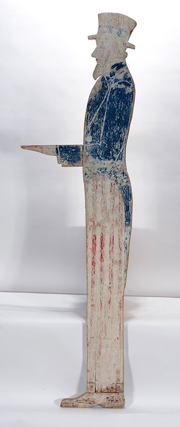 Uncle Sam Sign Holder.: Uncle Sam Sign Holder.Carved and painted wood. Lots of environmental paint wear and loss otherwise good condition. 56” h x 16”w. Est. $200-400. Ship: $75