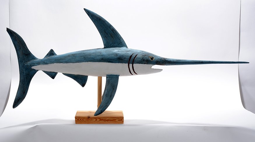 Leroy Archuleta. Swordfish.: Leroy Archuleta. Swordfish.1995. Signed and dated. Carved and painted wood with glass eyes. Minor chip on rear top fin, otherwise great condition. 45”long x 22”h x 6”w. Provenance: The private c