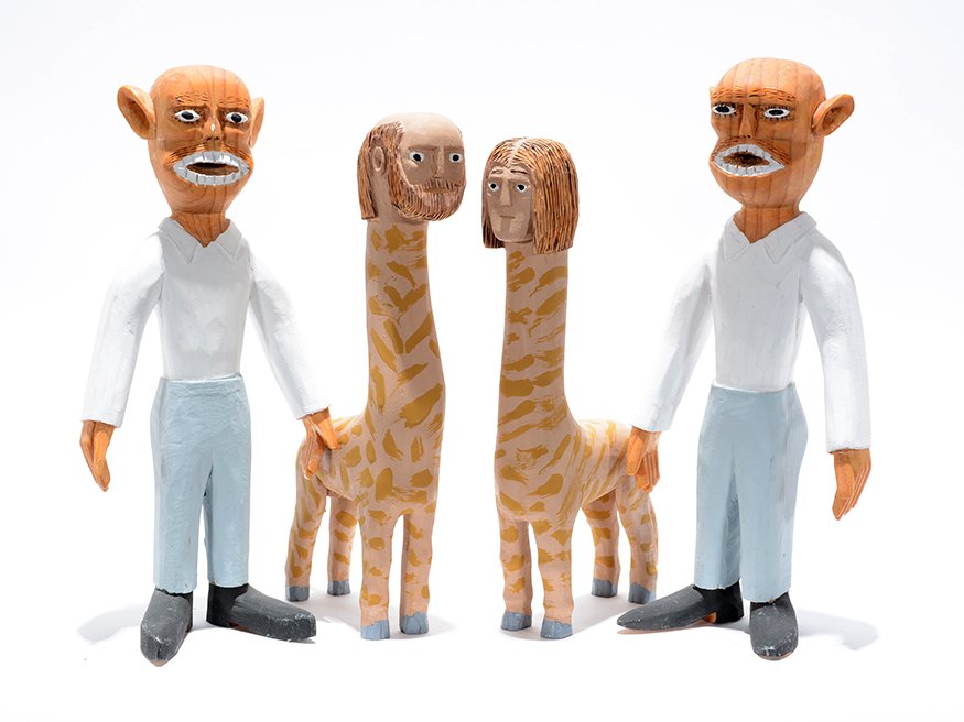 Sulton Rogers. Twin Men With Giraffe Couple: Sulton Rogers. Twin Men With Giraffe Couple.Not signed or dated. Carved and painted wood. Excellent condition. Tallest is 9.5”h. Provenance: The private collection of Leslie Muth. Est. $400-800. Shi