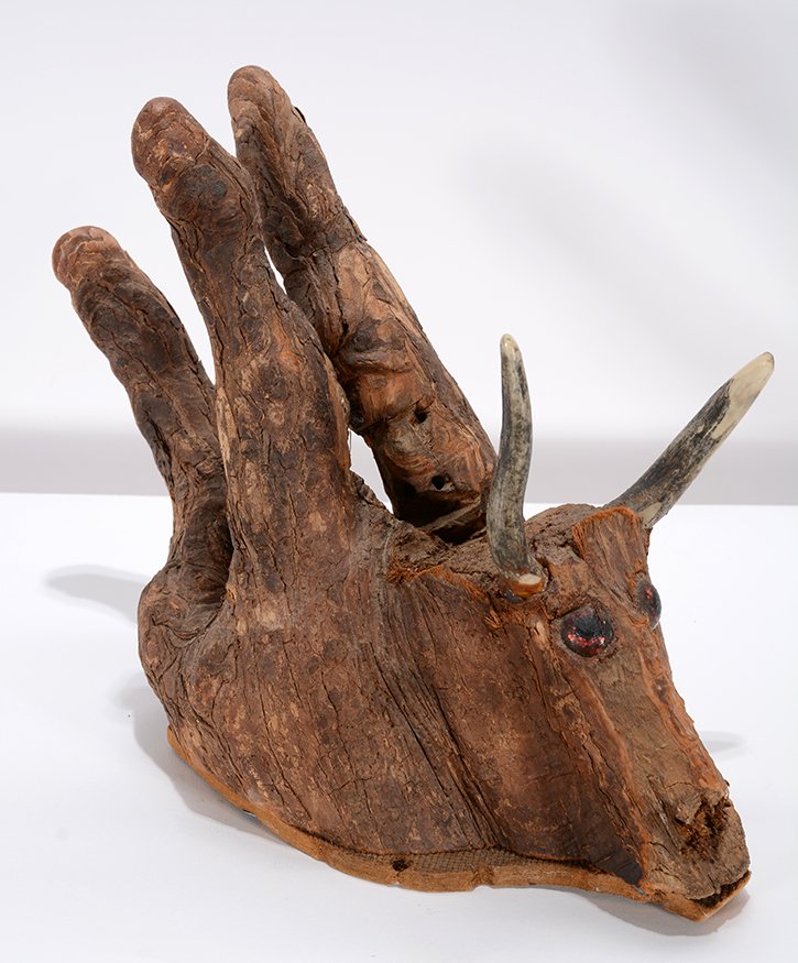 Jesse Aaron. Two Men Arguing Over Cow.: Jesse Aaron. Two Men Arguing Over Cow.1978. Carved cypress wood knee sculpture with plastic eyes and goat horns. Excellent condition. 11” x 9” x 5”. Provenance: Luise Ross Gallery. Est. $800-1,2
