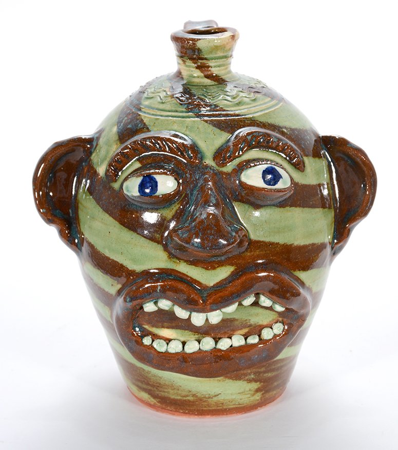 Albert Hodge. Two Color Swirl Face Jug. (1 of 2)