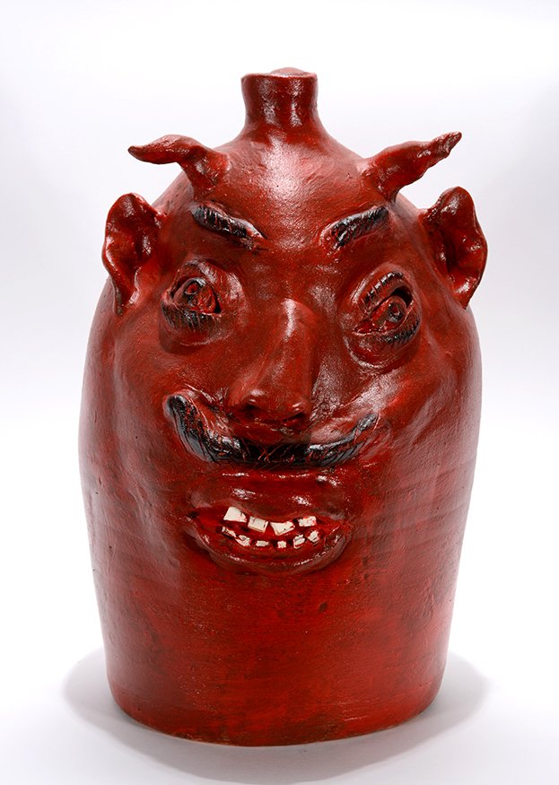 Louis Brown. Large Red Devil With Turned Up Moustache. (1 of 3)