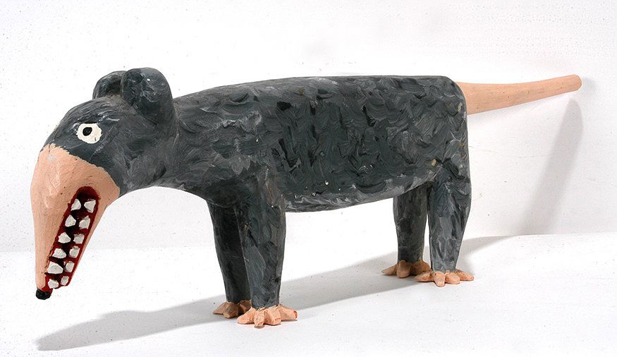 Minnie & Garland Adkins. Early Possum.: Minnie & Garland Adkins. Early Possum. 1988. Signed and dated. Carved and painted wood. Excellent condition. 8” x 24” x 3”. Est. $1,000-2,000. Ship: $85