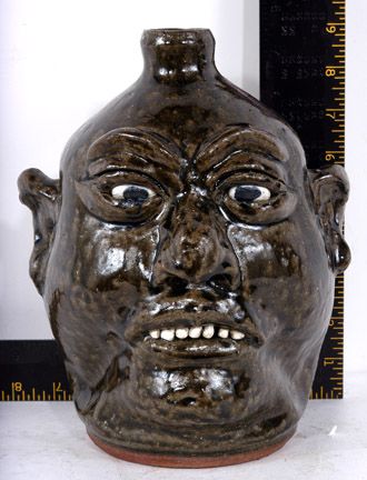 Lanier Meaders Face Jug: Lanier Meaders Face Jug, c. mid 1980's. Nice tobacco-spit glaze all the way around. 9" h. Mint condition. Est. $1,500-2,000 Ship: $35