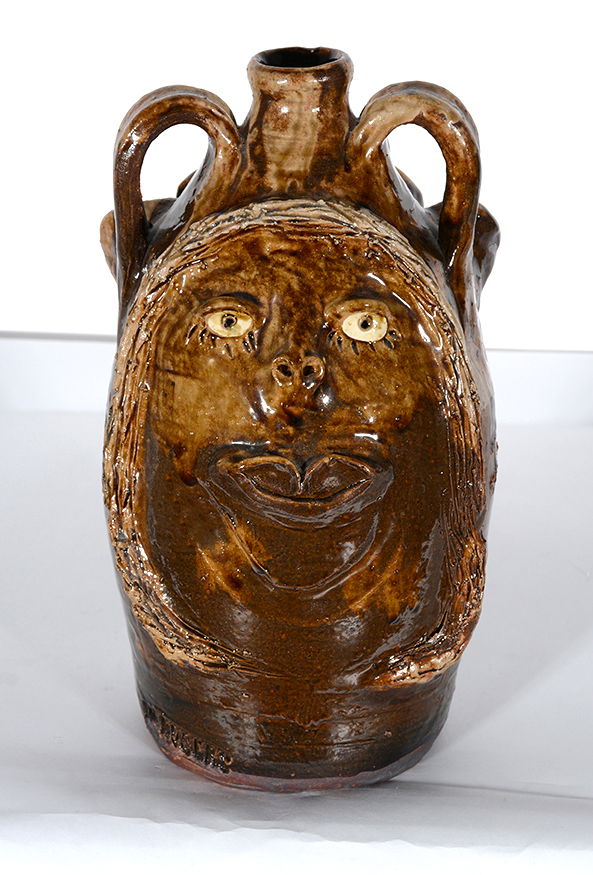 Marie Rogers. Man & Woman Face Jug. (1 of 4)