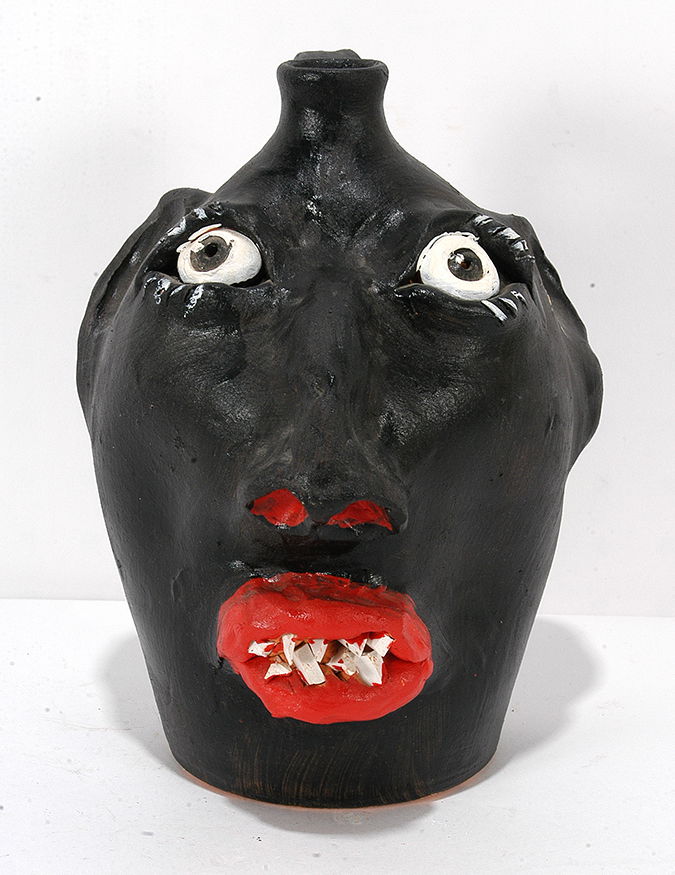 Brown Pottery. Black Face Jug. (1 of 4)