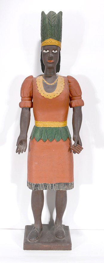 Clarence Stringfield. Indian Princess Cigarstore Figure: Clarence Stringfield. Indian Princess Tobacconist Figure. 1968. Signed and dated. Carved and painted wood. Natural wood separation at neck and body, otherwise excellent condition. 59”h x 16”w x 11