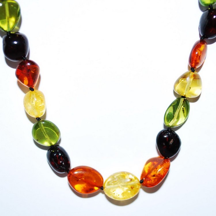 Horizontal Drill Mix Color Caribbean And Baltic A: Date Of Manufacture: Brand New Country Of Origin: Lithuania Material: Baltic Amber Dimensions: 15.75 Inches in Length weight 16.59 g Necklace handmade from beautiful sparkling shining nicety polished 