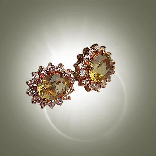 Gold Plated Set of Earrings With Citrine Stones A: Date Of Manufacture: Approximately 1910Country Of Origin: GermanyMaterial: Gold Plated-925,Lemon StoneDimensions: 0,60 x 0,50 InchesGold Plated Set of Earrings Decorated With Citrine Stones And Crysta