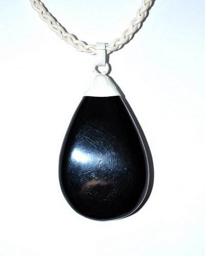 Blue Caribbean Amber Pendant With Leather String: Date Of Manufacture: Brand New Country Of Origin: Lithuania Material: Amber, Leather Dimensions: 20 inches Pendant 3x1.8x0.5 massive blue Caribbean amber drop form pendant with white leather string. T