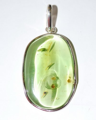 Big Size Pendant From Genuine Green Caribbean Amb: Date Of Manufacture: Brand New Country Of Origin: Lithuania Material: Caribbean Amber Dimensions: 2.2x1.3x0.1 inches Big size flat pendant carved from one piece genuine Caribbean amber and decorated w