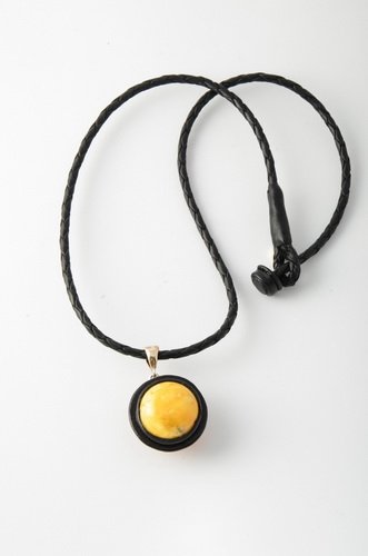Genuine Leather String With Baltic Amber: Date Of Manufacture: Brand New Country Of Origin: Lithuania Material: Caribbean amber, Leather Dimensions: 18 inches in length, pendant 1.2x1.2x0.8 inches String with pendant made from genuine leather