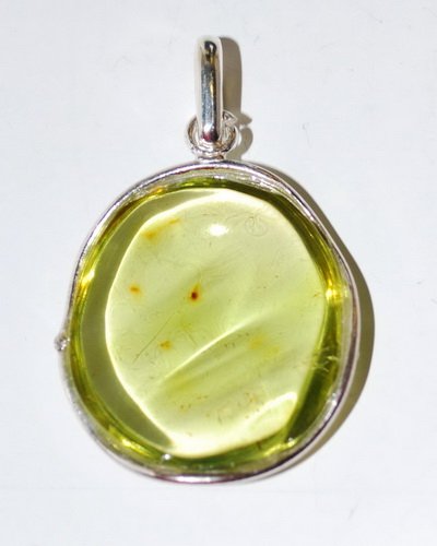 Big Size Pendant From Genuine Green Caribbean Amb: Date Of Manufacture: Brand New Country Of Origin: Lithuania Material: Caribbean Amber Dimensions: 2x1.1x0.1 inches Big size flat pendant carved from one piece genuine Caribbean amber and decorated wit