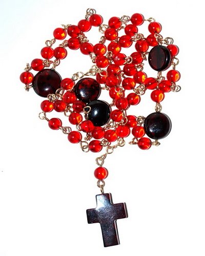 Catholic Rosary From Ruby Color Genuine Caribbean: Date Of Manufacture: Brand New Country Of Origin: Lithuania Material: Caribbean Amber Dimensions: 30 inches in length. cross 1x0.7x0.1 inches Catholic rosary made from genuine ruby color Caribbean amb