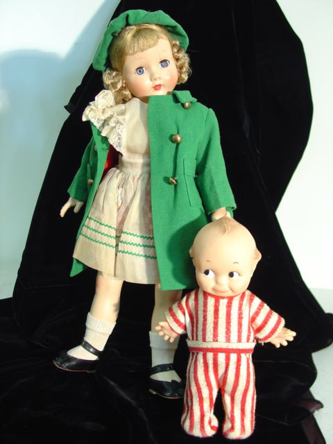 Dolls: Kewpie baby signed Cameo. Second doll is an Effanbee Honey 1940 era. Walker w/ flirty eyes. Crazing on face.