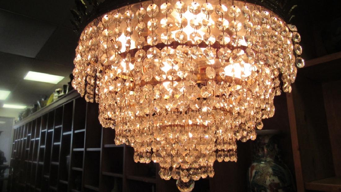 Art Deco Crystal Chandelier: Stunning Art Deco crystal chandelier with a gorgeous brass base. 15" dia. 15" high