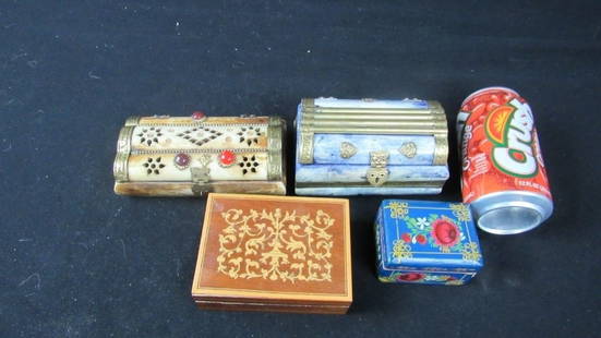 Set of Four Metal and Wood Jewelry Chests / Boxes: A set of four antique metal and wood jewelry boxes; Two are made of metal and shaped like chests, with gold detailing and decorative gem stones, lined with velvet; Two are carved out of wood and