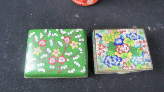 Pair of Old Chinese Cloisonne Jewelry Boxes: A set of two antique Chinese cloisonne jewelry boxes; Both feature a beautiful flower pattern; The green jewelry box stands on four metal feet; Very well made; For size reference please compare 