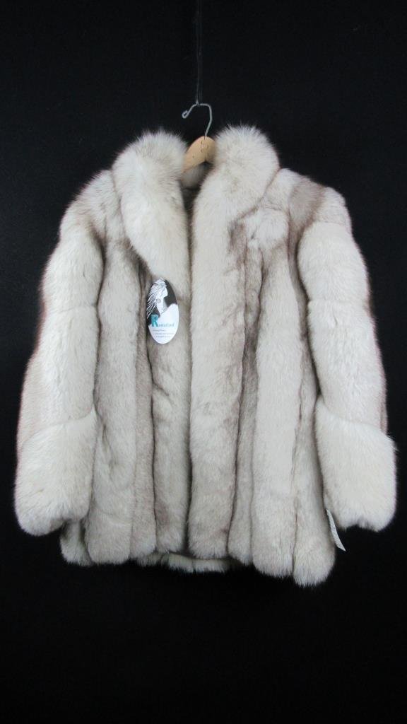 White Fox Fur Coat: A white and brown fur coat; Marked a size small; Very luxurious; Short fur coat length; Beautiful fur;
