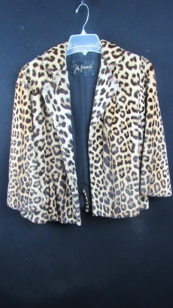 Vintage Fur Coat Jacket: A beautiful fur coat; Beautifully patterned; Cropped sleeves for a vintage look; Excellent cut