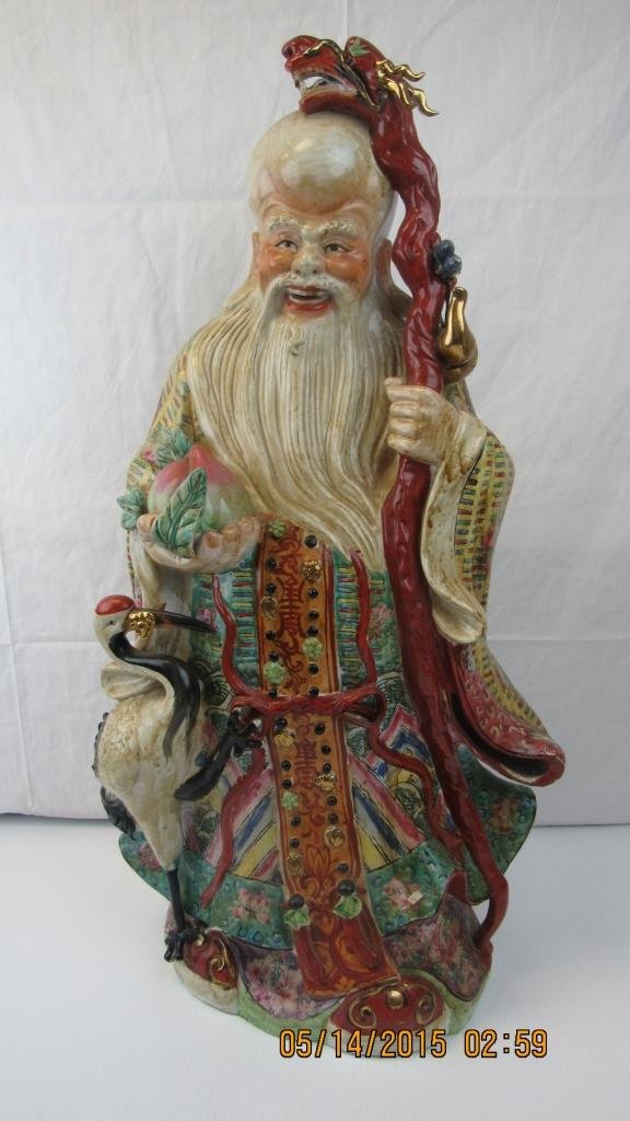 Asain Arts God "Old Man" Statue: Massive Chinese Porcelain Figure of a God "Old Man" symbloizing longevity, Holding a dragon cane, painted with gilded accents, 20th Century 31" x 17"