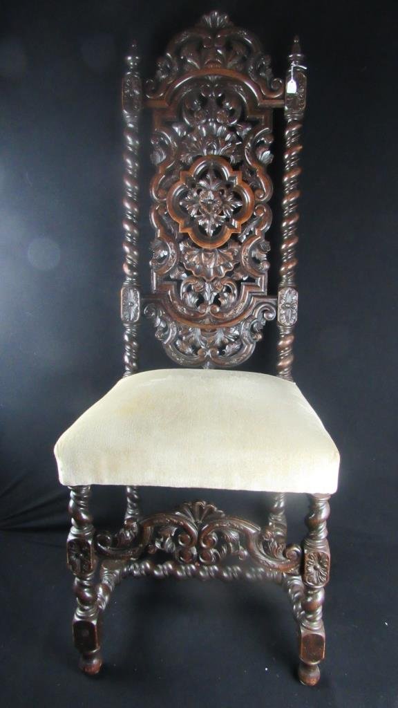 ABaroque Huanghuali Hall Chair: Old hall chair with intricately carved scrolling floral design details. 50.75" x 17"