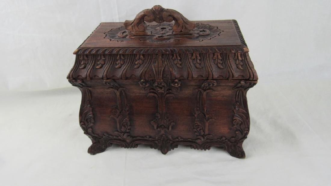 Beautiful Carved Wood Box: Stunning quality and design accent this great carved wood box with classic design details and a floral handle on the lid. Superb quality and craftsmanship. 10" high 11.5" wide 6.5" deep