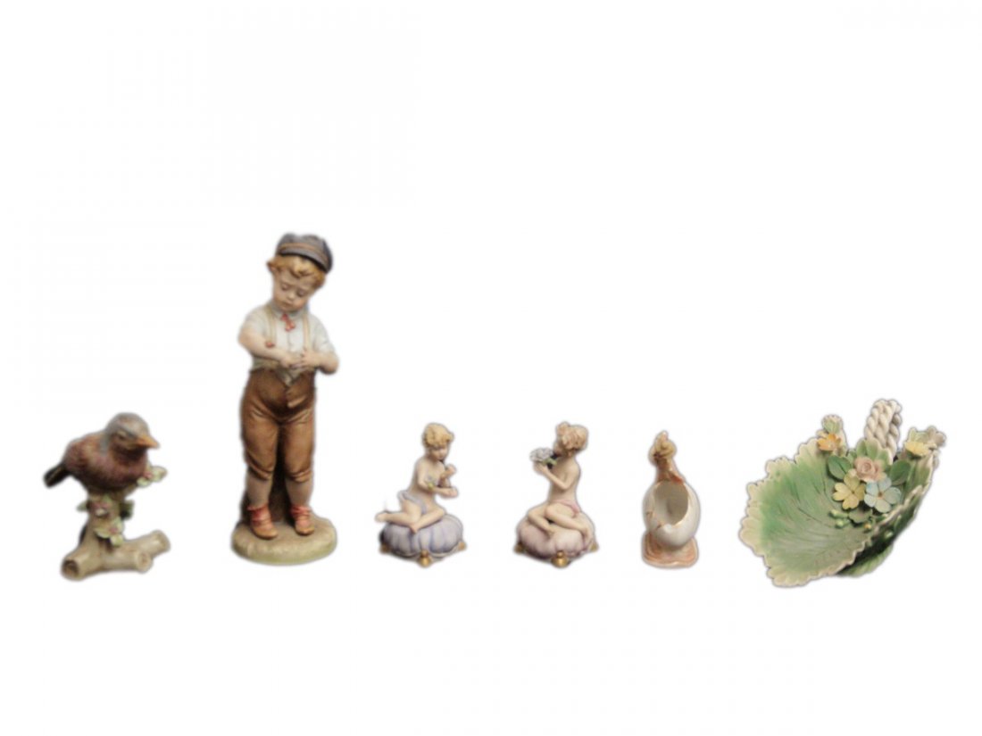 N.6 OGGETTI: in porcellana Capodimontemisure varie