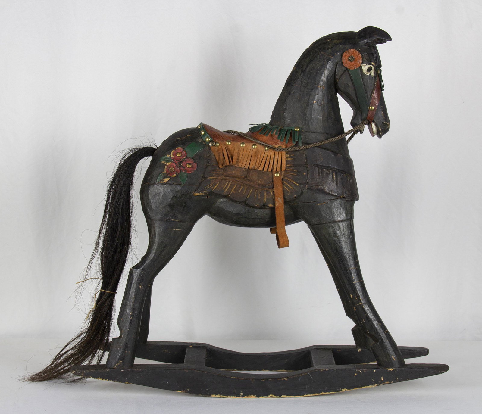 CAVALLO A DONDOLO IN LEGNO: XX SECOLO MANIFATTURA MESSICANA. MIS 59 X 60 X 18 CM
