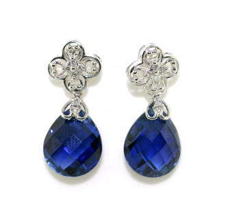 8 CT WHITE GOLD BLUE EARRINGS: THESE ARE A PAIR OF 10 KT WHITE GOLD BLUE TOPAZ EARRINGS WITH A TOTAL GEM WEIGHT OF 8 CT Circa: Contemporary