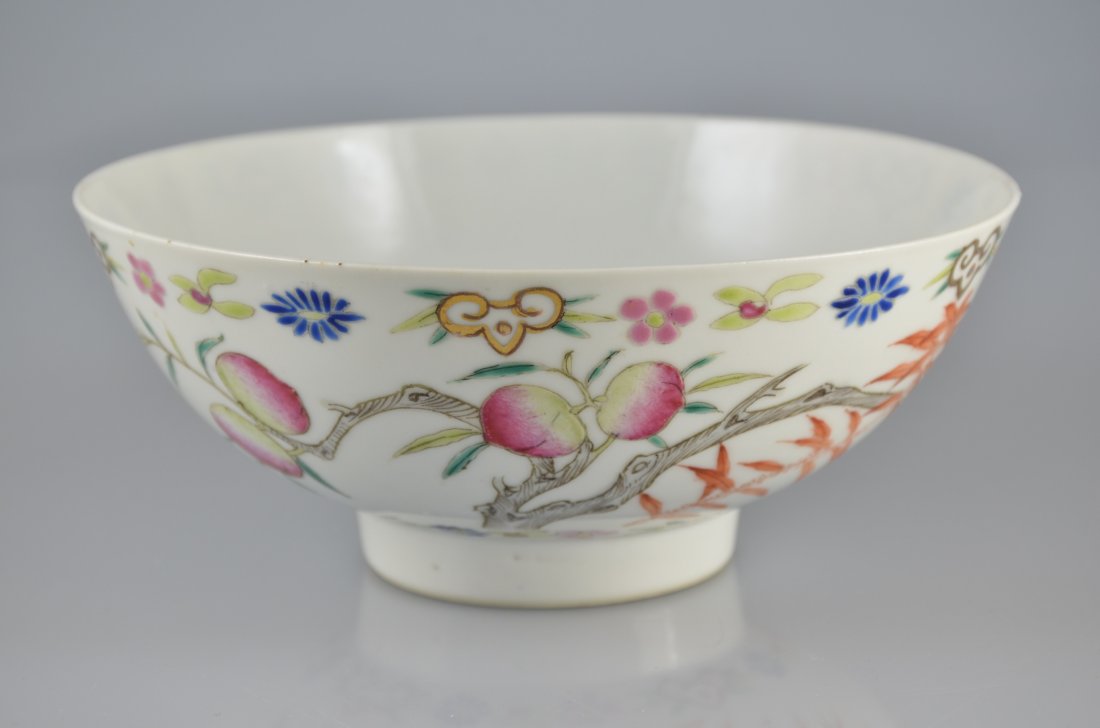 A GILT BLUE AND WHITE FAMILLE ROSE BOWL, MARKED 'DAO: H: 2 3/4"(7cm)